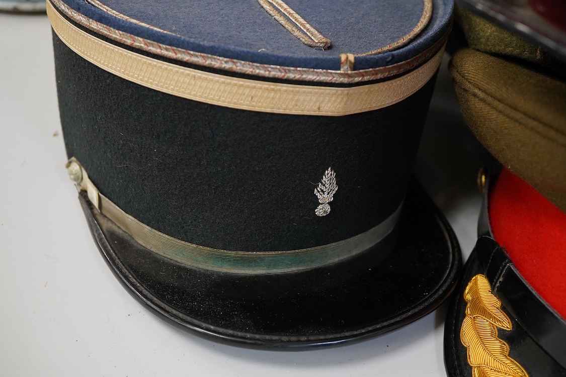 Four various caps, French Gendarme police hat etc